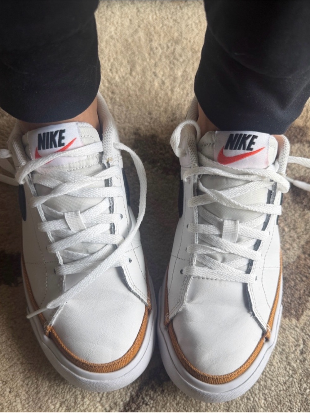 Nike White Low-Top Sneakers with Orange Accent